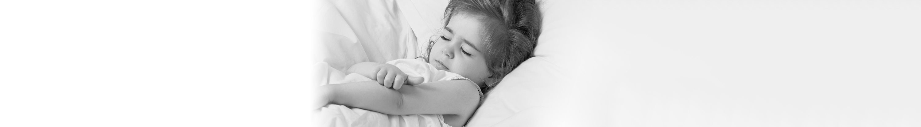 Little girl scratching the crook of her arm.